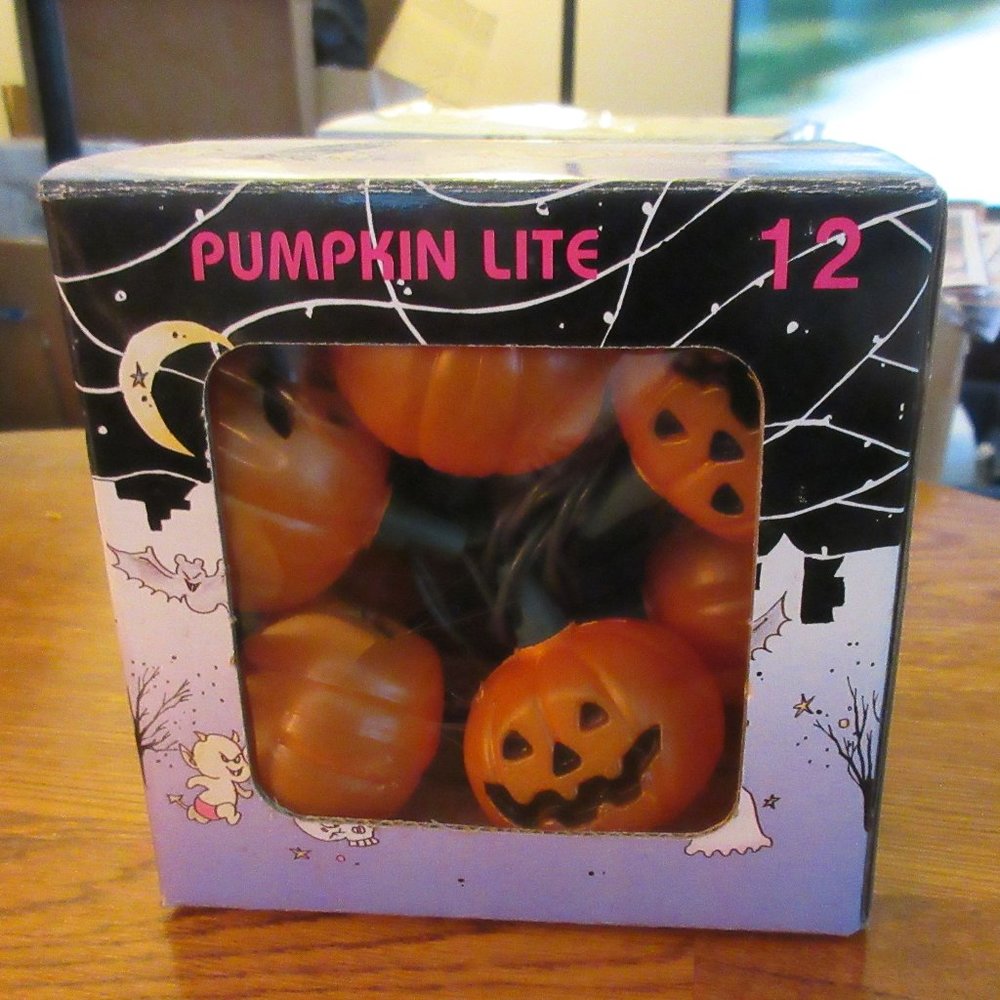 12 light up pumpkin Halloween string along lights